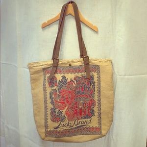 Lucky brand shoulder bag with buckle straps